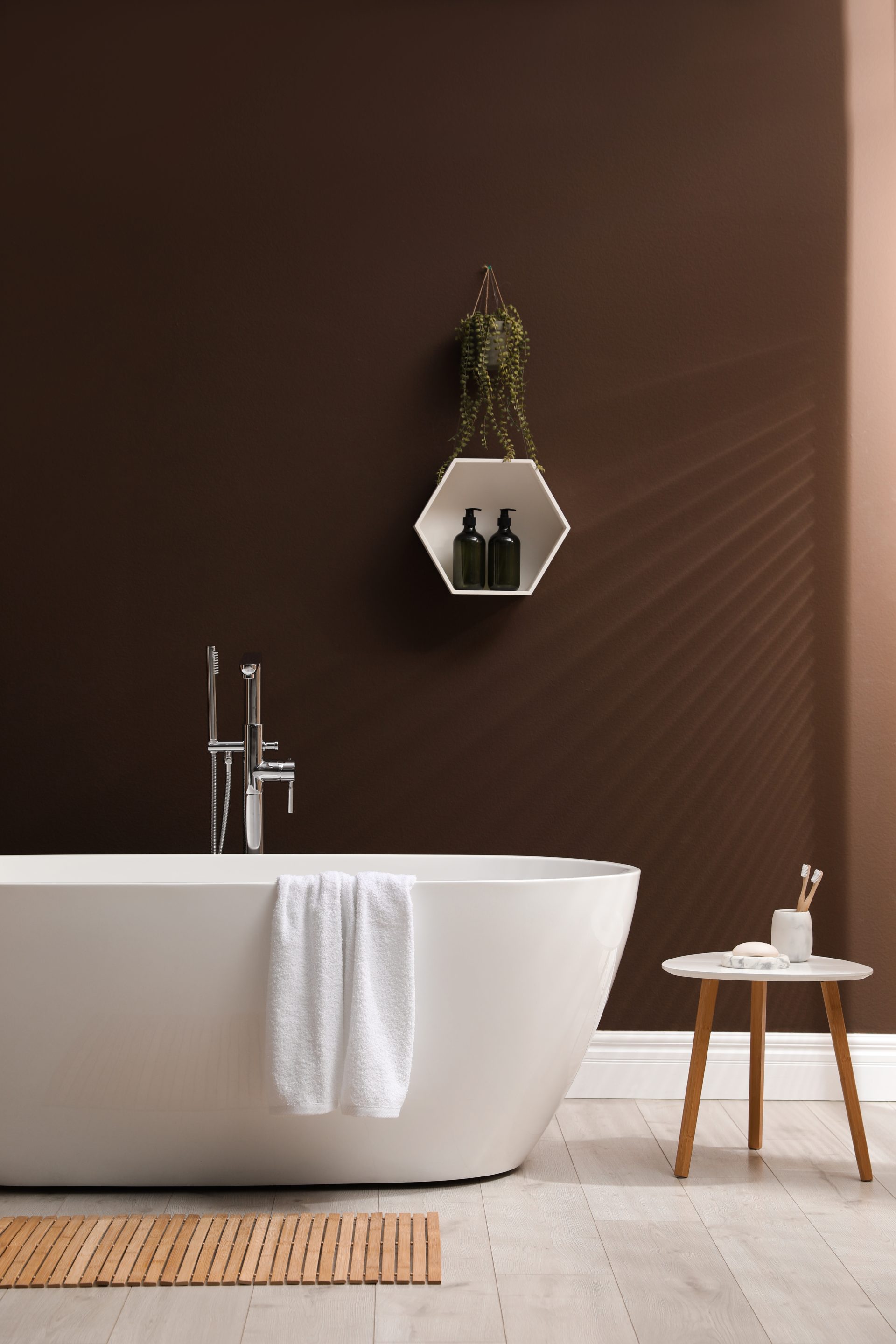 A newly installed bath with marble accented background in a bathroom